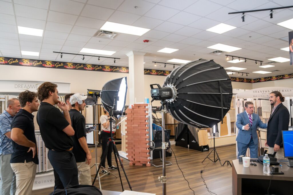 Crew lighting the showroom